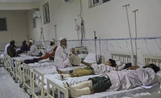 Afghans injured in a powerful earthquake that struck eastern Afghanistan on Sunday, lie on beds at Nangarhar Regional Hospital in Jalalabad, Afghanistan, Wednesday, Sept. 3, 2025. (AP Photo/Siddiqullah Alizai)