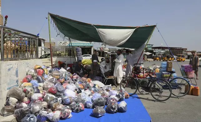 Afghan volunteers collect donations for victims of a powerful 6.0-magnitude earthquake that struck eastern Afghanistan on Sunday, in Jalalabad, Afghanistan, Thursday, Sept. 4, 2025. (AP Photo/Siddiqullah Alizai)