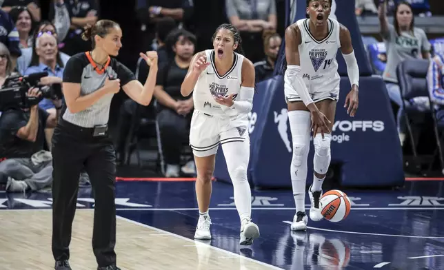 Veronica Burton (22) and Temi Fágbénlé (14) react to a call against the Valkyries in the first half as the Golden State Valkyries played the Minnesota Lynx in Game 1 of the WNBA first round playoffs at Target Center in Minneapolis, Minn., on Sunday, Sept. 14, 2025. (Carlos Avila Gonzalez/San Francisco Chronicle via AP)