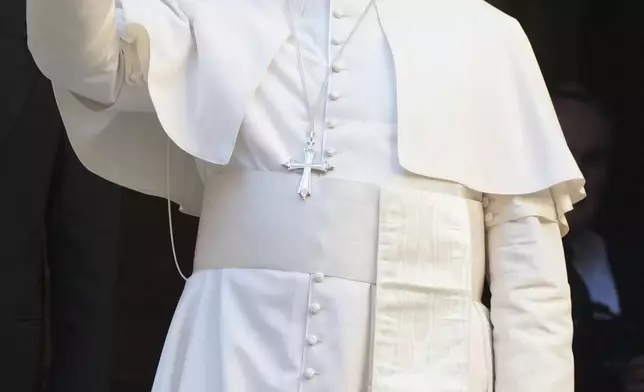 Pope Leo XIV waves upon his arrival at the St. Augustin Basilica in Rome, Monday, Sept. 1, 2025, to address his fellow Augustinians at the start of their global assembly. (AP Photo/Domenico Stinellis)
