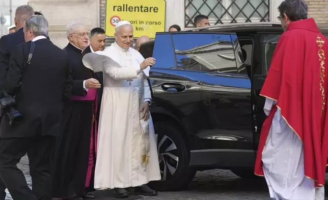 Pope Leo XIV arrives at the St. Augustin Basilica in Rome, Monday, Sept. 1, 2025, to address his fellow Augustinians at the start of their global assembly. (AP Photo/Domenico Stinellis)