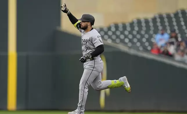 Chicago White Sox's Edgar Quero (7) runs the bases after hitting a solo home run during the second inning of a baseball game against the Minnesota Twins Wednesday, Sept. 3, 2025, in Minneapolis. (AP Photo/Abbie Parr)