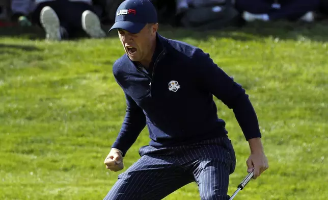 FILE - United States' Justin Thomas reacts after winning his fourball match with his teammate Jordan Spieth on the second day of the 2018 Ryder Cup at Le Golf National in Saint Quentin-en-Yvelines, outside Paris, France, Saturday, Sept. 29, 2018. (AP Photo/Francois Mori)