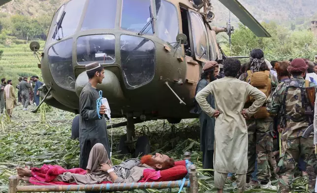 Injured victims of an earthquake that killed many people and destroyed villages in eastern Afghanistan are evacuated by military helicopter in Mazar Dara, Kunar province, Afghanistan, Monday, Sept. 1, 2025. (AP Photo/Wahidullah Kakar)