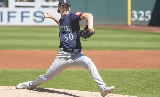 Seattle Mariners starting pitcher Bryce Miller delivers against the Cleveland Guardians during the first inning of a baseball game, Sunday, Aug. 31, 2025, in Cleveland. (AP Photo/Phil Long)