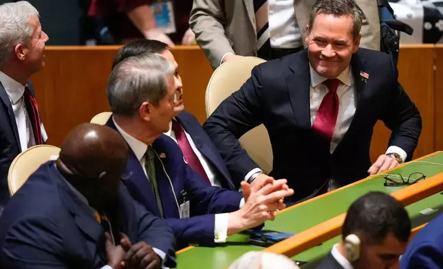 United States ambassador to the United Nations Mike Waltz, right, greets U.S. Secretary of the Treasury Scott Bessent and Secretary of State Marco Rubio during the United Nations General Assembly, Tuesday, Sept. 23, 2025, at U.N. headquarters. (AP Photo/Yuki Iwamura)