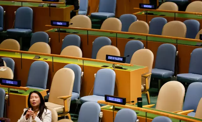Palestinian delegate seats sit empty along with others as Israeli Prime Minister Benjamin Netanyahu speaks during the 80th session of the United Nations General Assembly, Friday, Sept. 26, 2025, at U.N. headquarters. (AP Photo/Stefan Jeremiah)