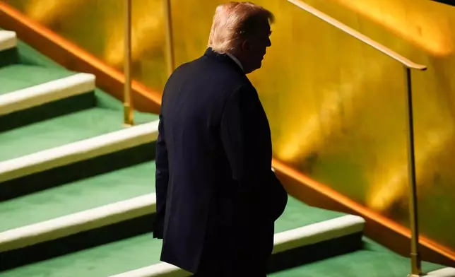 President Donald Trump leaves after addressing the 80th session of the United Nations General Assembly, Tuesday, Sept. 23, 2025, at U.N. headquarters. (AP Photo/Yuki Iwamura)