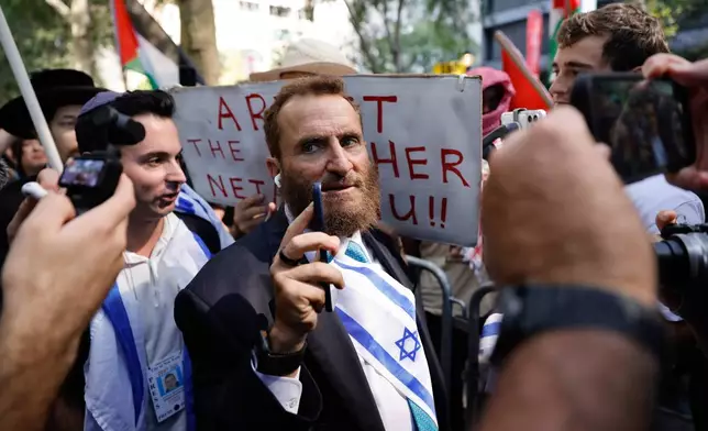 Rabbi Shmuley Boteach confronts pro-Palestinian demonstrators outside United Nations headquarters, Friday, Sept. 26, 2025, in New York. (AP Photo/Stefan Jeremiah)