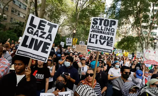 People demonstrate at Dag Hammarskjold Plaza during a pro-Palestinian Protest, Friday, Sept. 26, 2025, in New York. (AP Photo/Stefan Jeremiah)
