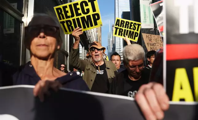 Protesters march and attempt to block a street during the 80th session of the United Nations General Assembly in New York, Tuesday, Sept. 23, 2025. (AP Photo/Heather Khalifa)