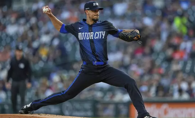 Detroit Tigers starting pitcher Charlie Morton throws during the first inning of a baseball game against the Atlanta Braves, Friday, Sept. 19, 2025, in Detroit. (AP Photo/Ryan Sun)