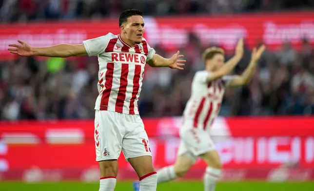 Cologne's Said El Mala reacts during the German Bundesliga soccer match between Cologne and Stuttgart in Cologne, Germany, Sunday, Sept. 28, 2025. (AP Photo/Martin Meissner)