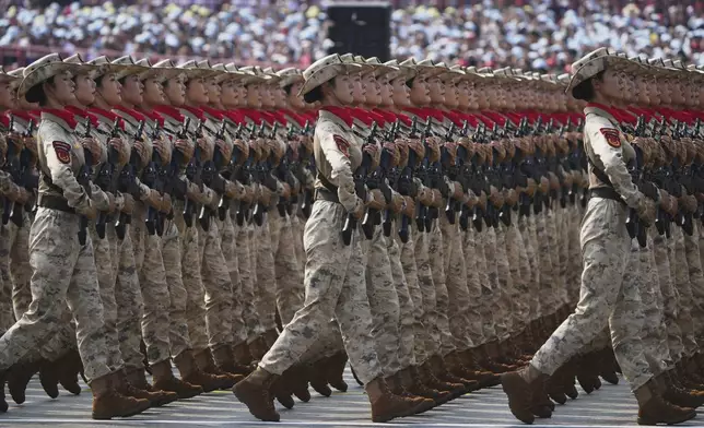 Military personnel take part in a military parade to commemorate the 80th anniversary of Japan's World War II surrender held in front of Tiananmen Gate in Beijing, Wednesday, Sept. 3, 2025. (AP Photo/Andy Wong)