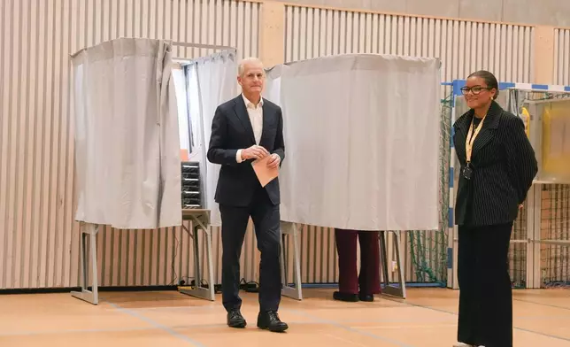 Labor Party leader Jonas Gahr Store leaves a polling booth during Norway’s Parliamentary elections in Oslo, Norway, Monday, Sept. 8, 2025. (Javad Parsa/NTB Scanpix via AP)