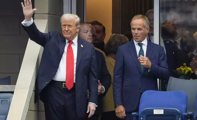 President Donald Trump waves as he arrives at the US Open tennis men's singles final Sunday, Sept. 7, 2025, in Flushing, N.Y. (AP Photo/Manuel Balce Ceneta)