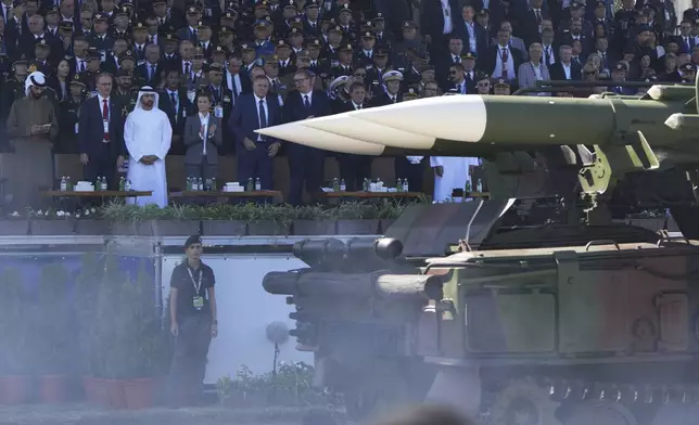 Serbian President Aleksandar Vucic and Bosnian Serb leader Milorad Dodik attend a military parade in Belgrade, Serbia, Saturday, Sept. 20, 2025. (AP Photo/Darko Vojinovic)