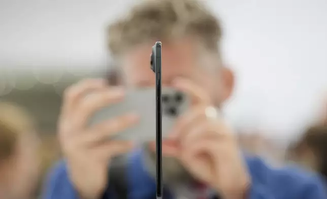 The iPhone Air is displayed during an announcement of new products at Apple Park on Tuesday, Sept. 9, 2025, in Cupertino, Calif. (AP Photo/Godofredo A. Vásquez)
