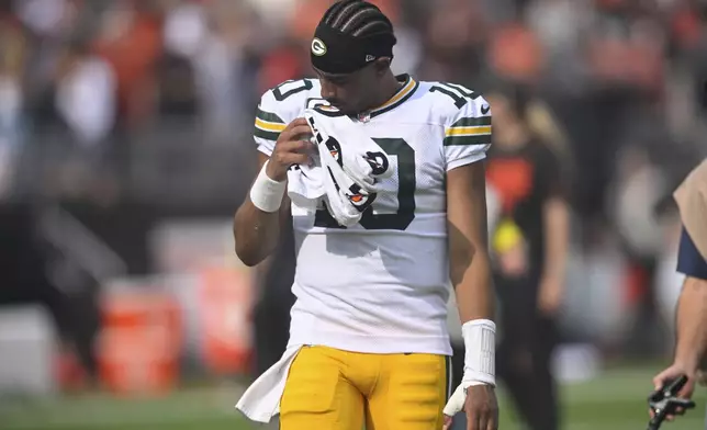 Green Bay Packers' Jordan Love walks off the field after an NFL football game against the Cleveland Browns Sunday, Sept. 21, 2025, in Cleveland. (AP Photo/David Richard)
