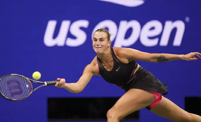 Aryna Sabalenka, of Belarus, returns a shot to Jessica Pegula, of the United States, during the women's singles semifinals of the U.S. Open tennis championships, Thursday, Sept. 4, 2025, in New York. (AP Photo/Seth Wenig)