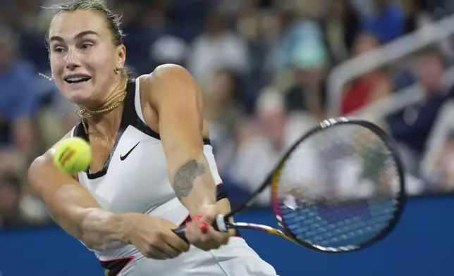 Aryna Sabalenka, of Belarus, returns a shot to Cristina Bucsa, of Spain, during the fourth round of the US Open tennis championships, Sunday, Aug. 31, 2025, in New York. (AP Photo/Pamela Smith)