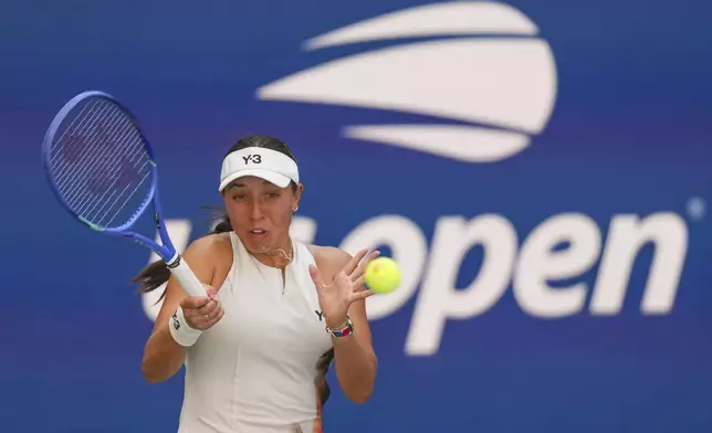 Jessica Pegula, of the United States, returns a shot to Barbora Krejcikova, of the Czech Republic, during the quarterfinal round of the US Open tennis championships, Tuesday, Sept. 2, 2025, in New York. (AP Photo/Kirsty Wigglesworth)
