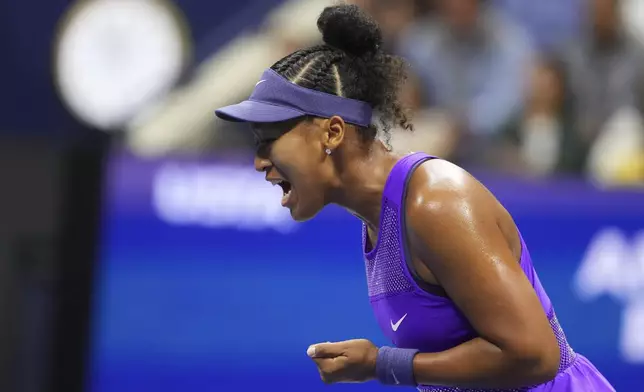 Naomi Osaka, of Japan reacts against Amanda Anisimova, of the United States, during the women's singles semifinals of the U.S. Open tennis championships, Thursday, Sept. 4, 2025, in New York. (AP Photo/Kirsty Wigglesworth)