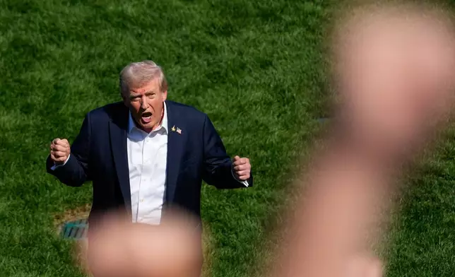 President Donald Trump addresses the crowd as he attends the Ryder Cup golf tournament, Friday, Sept. 26, 2025, on the Bethpage Black golf course in Farmingdale, N.Y. (AP Photo/Alex Brandon)