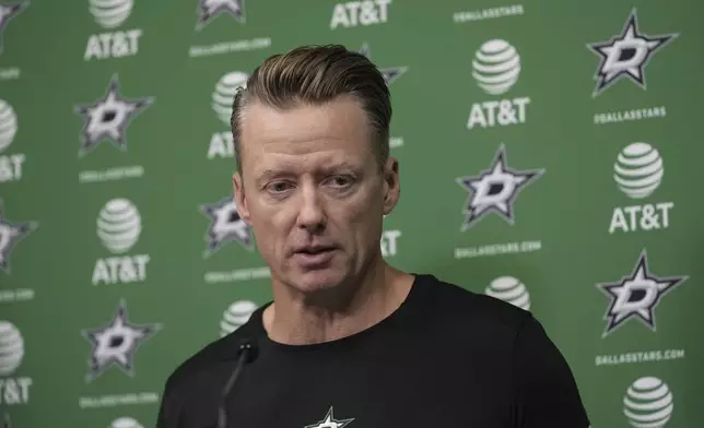 Dallas Stars head coach Glen Gulutzan responds to questions during a news conference at the NHL hockey team's headquarters, Wednesday, Sept. 17, 2025, in Frisco, Texas. (AP Photo/Tony Gutierrez)