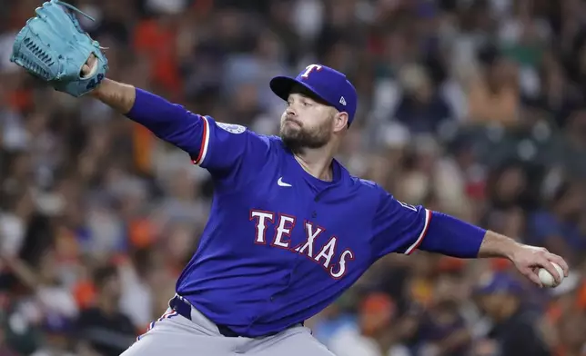 Texas Rangers relief pitcher Danny Coulombe throws against the Houston Astros during the fifth inning of a baseball game Tuesday, Sept. 16, 2025, in Houston. (AP Photo/Michael Wyke)