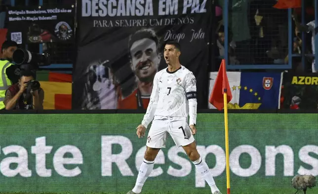Portugal's Cristiano Ronaldo celebrates after scoring his side's second goal during a World Cup 2026 group F qualifying soccer match between Armenia and Portugal at the Vazgen Sargsyan stadium in Yerevan, Armenia, Saturday, Sept. 6, 2025. (AP Photo/Hakob Berberyan)