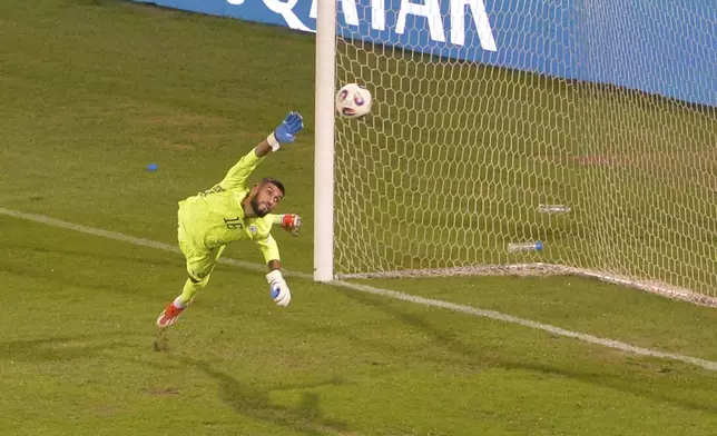 Armenia's goalkeeper Henri Avagyan fails to save the shot from Portugal's Cristiano Ronaldo during a World Cup 2026 group F qualifying soccer match between Armenia and Portugal at the Vazgen Sargsyan stadium in Yerevan, Armenia, Saturday, Sept. 6, 2025. (AP Photo/Hakob Berberyan)