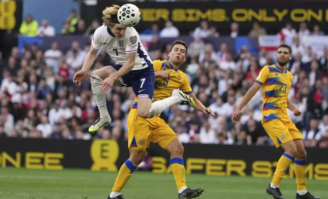 England's Anthony Gordon heads the ball during the World Cup Group K qualifying match between England and Andorra at Villa Park stadium in Birmingham, Saturday, Sept. 6, 2025 . (AP Photo/Dave Shopland)