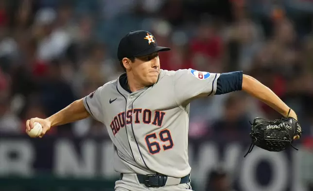 Houston Astros starting pitcher AJ Blubaugh throws against the Los Angeles Angels during the first inning of a baseball game Saturday, Sept. 27, 2025, in Anaheim, Calif. (AP Photo/Jae C. Hong)