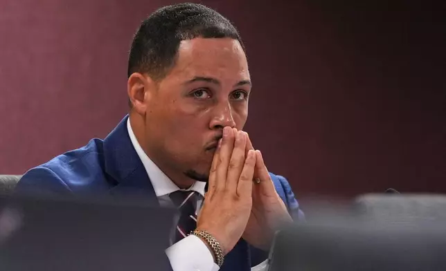 Ranking minority member Missouri state Rep. Mark Sharp, D-Kansas City, listens as lawmakers hold a committee hearing to consider redrawing the state's U.S. House districts, Thursday, Sept. 4, 2025, in Jefferson City, Mo. (AP Photo/Jeff Roberson)