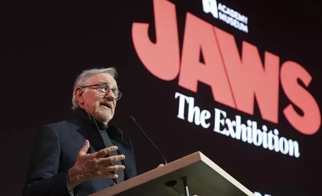 Steven Spielberg, director of the 1975 film "Jaws," addresses the audience during the "Jaws: The Exhibition" press preview on Wednesday, Sept. 10, 2025, at the Academy Museum of Motion Pictures in Los Angeles. (AP Photo/Chris Pizzello)