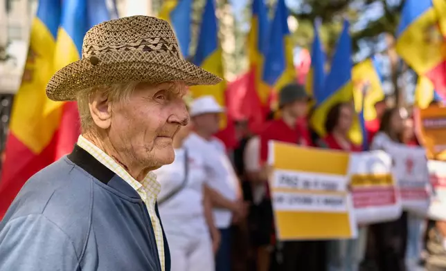 An elderly man attends a rally of the Russia-friendly Patriotic Electoral Bloc in Chisinau, Moldova, Wednesday, Sept. 24, 2025, ahead of parliamentary elections taking place on Sept. 28. (AP Photo/Vadim Ghirda)