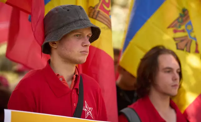 Youngsters attend a rally of the Russia-friendly Patriotic Electoral Bloc in Chisinau, Moldova, Wednesday, Sept. 24, 2025, ahead of parliamentary elections taking place on Sept. 28. (AP Photo/Vadim Ghirda)