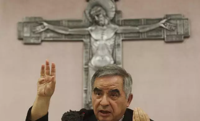 FILE — Cardinal Angelo Becciu talks to journalists during news conference in Rome, Sept. 25, 2020. (AP Photo/Gregorio Borgia, File)