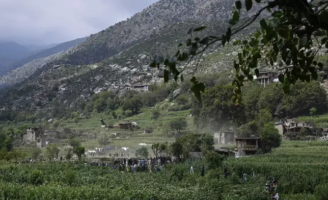 A military helicopter takes off carrying injured survivors of Sunday night's powerful 6.0-magnitude earthquake in a damaged village of Kunar province, eastern Afghanistan, Tuesday, Sept. 2, 2025. (AP Photo/Nava Jamshidi)