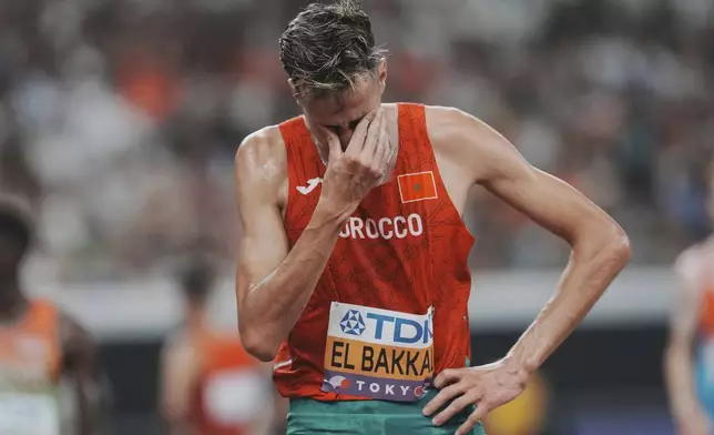 Silver medalist Morocco's Soufiane El Bakkali reacts after competing in the men's 3,000 meters steeplechase final at the World Athletics Championships in Tokyo, Monday, Sept. 15, 2025. (AP Photo/Eugene Hoshiko)