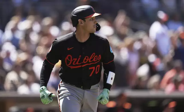 Baltimore Orioles' Alex Jackson watches his home run during the third inning of a baseball game against the San Diego Padres Wednesday, Sept. 3, 2025, in San Diego. (AP Photo/Gregory Bull)