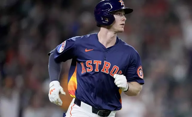 Houston Astros' Zachary Cole rounds the bases after hitting a solo home run against the Seattle Mariners during the third inning of a baseball game Sunday, Sept. 21, 2025, in Houston. (AP Photo/Eric Christian Smith)
