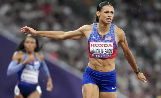 United States' Sydney McLaughlin-Levrone wins the gold medal in the women's 400 meters final at the World Athletics Championships in Tokyo, Thursday, Sept. 18, 2025. (AP Photo/Petr David Josek)