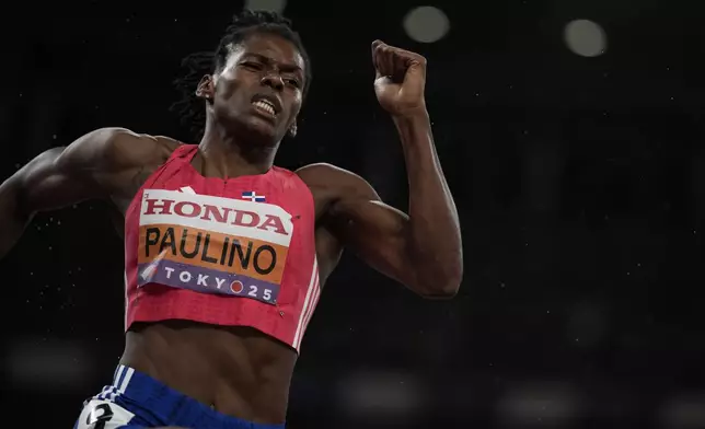 Dominican Republic's Marileidy Paulino silver medalist in the women's 400 meters final competes at the World Athletics Championships in Tokyo, Thursday, Sept. 18, 2025. (AP Photo/Louise Delmotte)