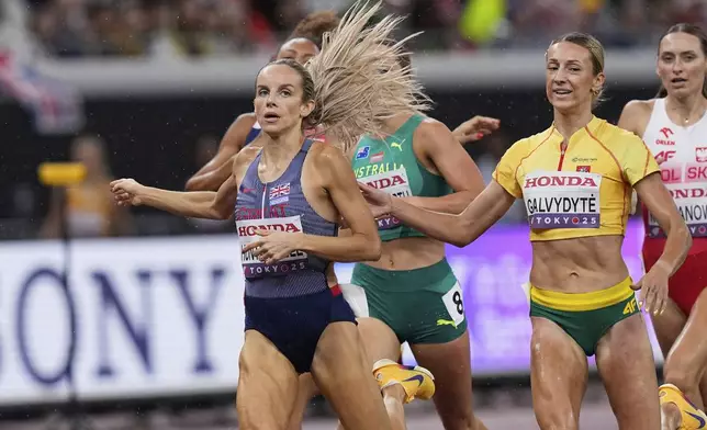 Britain's Georgia Hunter Bell races ahead of others to compete in women's 800 meters heat at the World Athletics Championships in Tokyo, Thursday, Sept. 18, 2025. (AP Photo/Eugene Hoshiko)