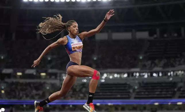 Venezuela's Yulimar Rojas makes an attempt in the women's triple jump final at the World Athletics Championships in Tokyo, Thursday, Sept. 18, 2025. (AP Photo/Matthias Schrader)