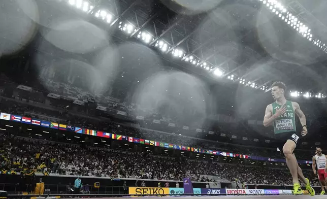 Ireland's Cian McPhillips wins a men's 800 meters semifinal at the World Athletics Championships in Tokyo, Thursday, Sept. 18, 2025. (AP Photo/David J. Phillip)