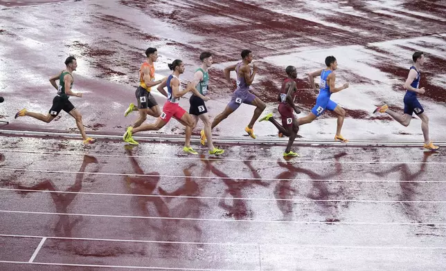 Athletes compete in the men's 800 meters semifinal at the World Athletics Championships in Tokyo, Thursday, Sept. 18, 2025. (AP Photo/Abbie Parr)