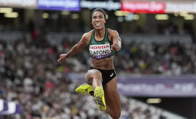Dominica's Thea Lafond makes an attempt in the women's triple jump final at the World Athletics Championships in Tokyo, Thursday, Sept. 18, 2025. (AP Photo/Matthias Schrader)